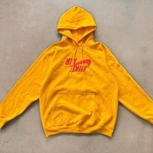 Nike Golden Hoodie with Crimson Logo